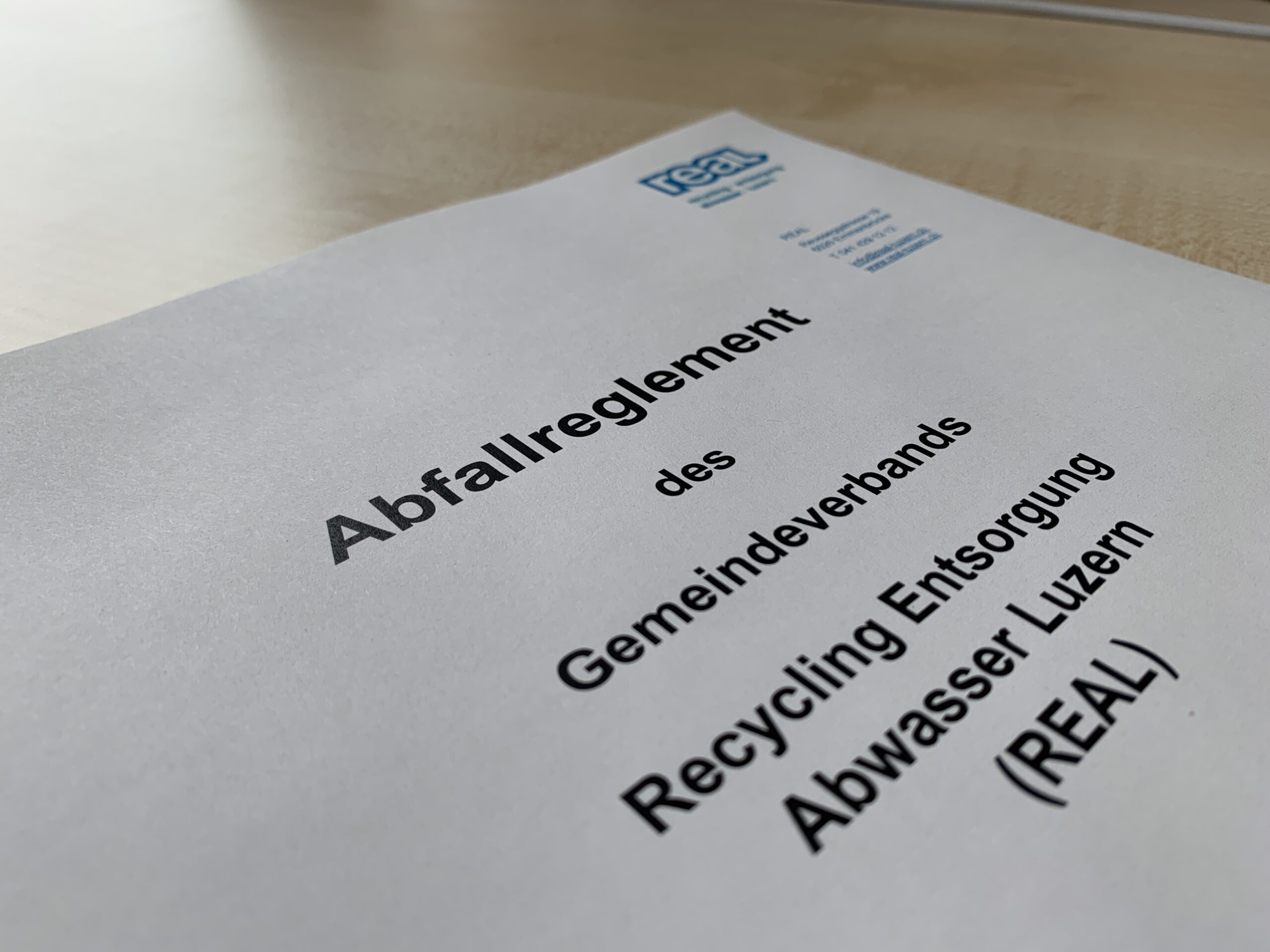 Foto des Abfallreglements von REAL.